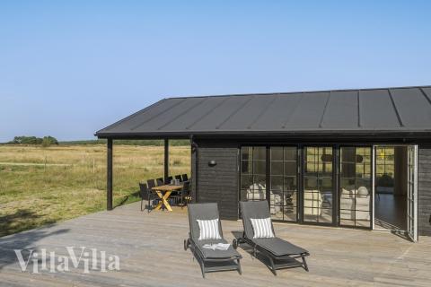 Auf der Terrasse des Ferienhauses Nr. 693 ist Platz für 11 Personen.