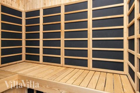 Genießen Sie die heiße Sauna im Luxusferienhaus Nr. 690 für 20 Personen