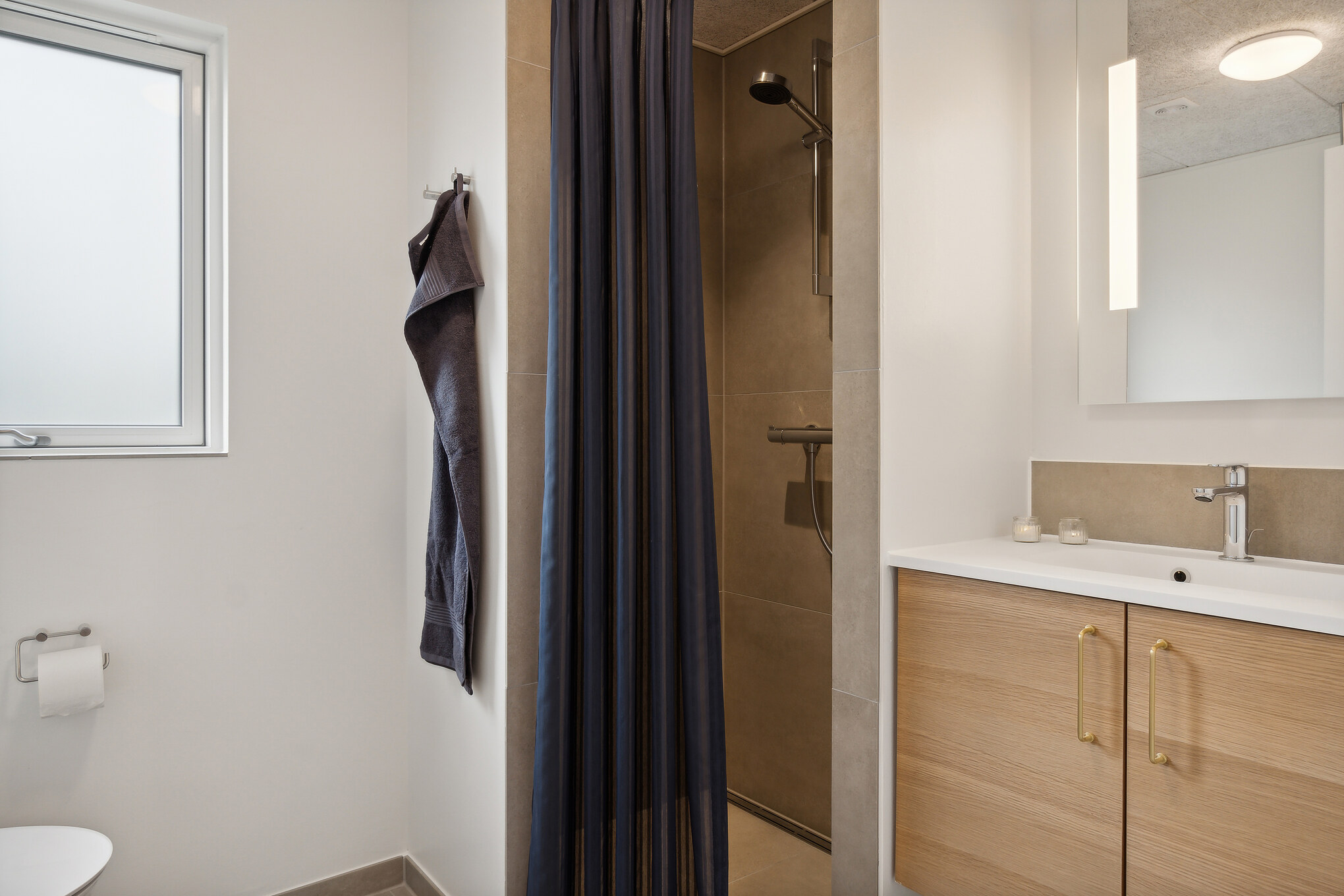 Eines der Badezimmer im Luxusferienhaus Nr. 667