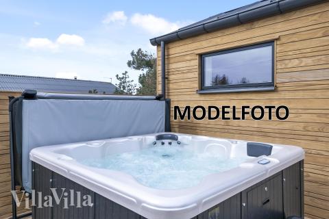 Genießen Sie den warmen Whirlpool im Luxusferienhaus Nr. 687 in Westjütland