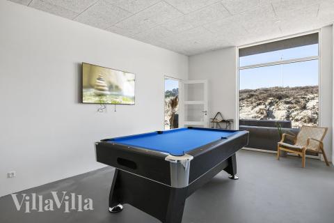 Neben den vielen schönen Stunden, die man im Poolbereich des Hauses verbringen kann, bietet das Luxusferienhaus 687 auch Spielevergnügen bei Billard/Tischtennis und Darts