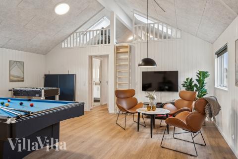 Neben den vielen schönen Stunden, die man im Poolbereich des Hauses verbringen kann, bietet das Luxusferienhaus 648 auch Spielevergnügen bei Billard/Tischtennis und Darts