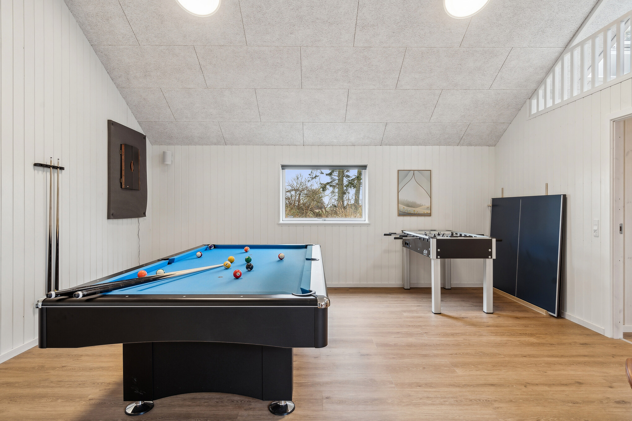 Das Luxusferienhaus 648 für 14 Personen hat einen großen Aktivitätsraum mit u. a. Billard und Darts