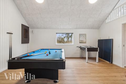 Das Luxusferienhaus 648 für 14 Personen hat einen großen Aktivitätsraum mit u. a. Billard und Darts