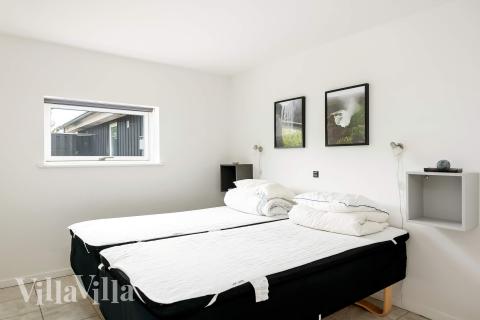 Eines der 10 Schlafzimmer im Luxusferienhaus Nr. 602