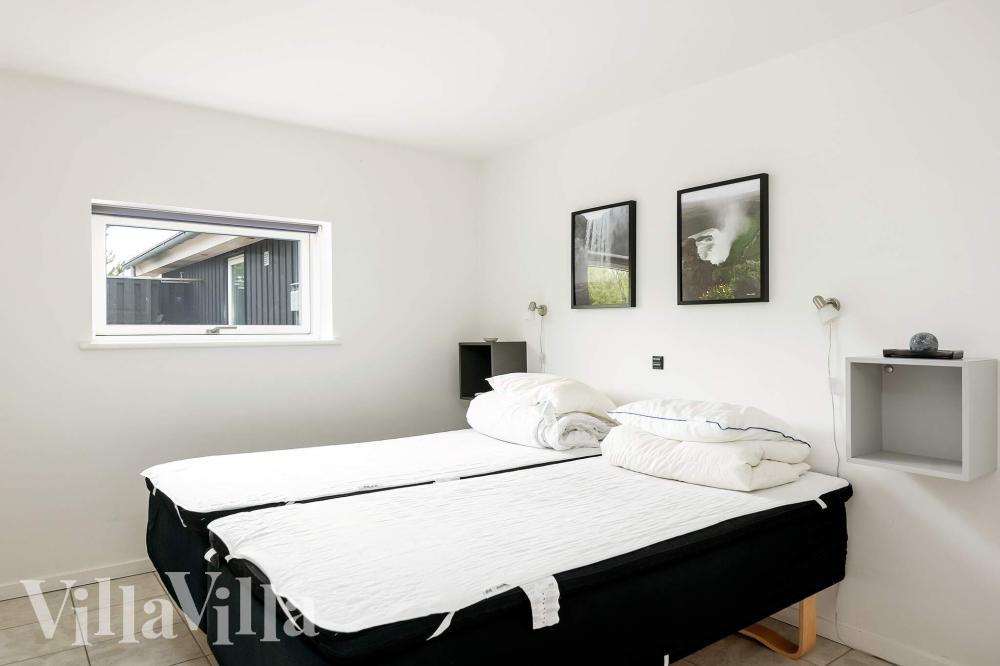 Eines der 10 Schlafzimmer im Luxusferienhaus Nr. 602
