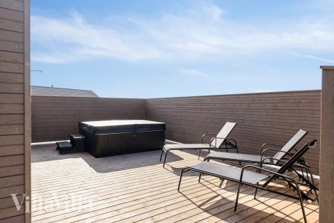 Genießen Sie den warmen Whirlpool im Luxusferienhaus Nr. 648 in Fünen und seine Inseln