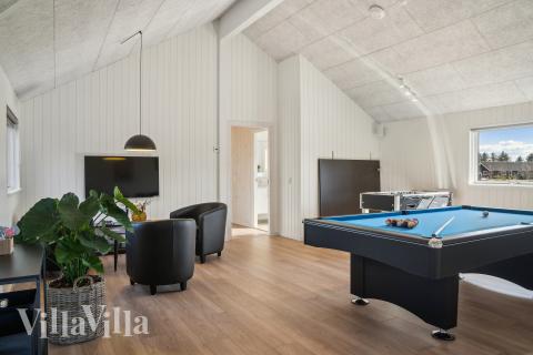 Neben den vielen schönen Stunden, die man im Poolbereich des Hauses verbringen kann, bietet das Luxusferienhaus 666 auch Spielevergnügen bei Billard/Tischtennis und Darts