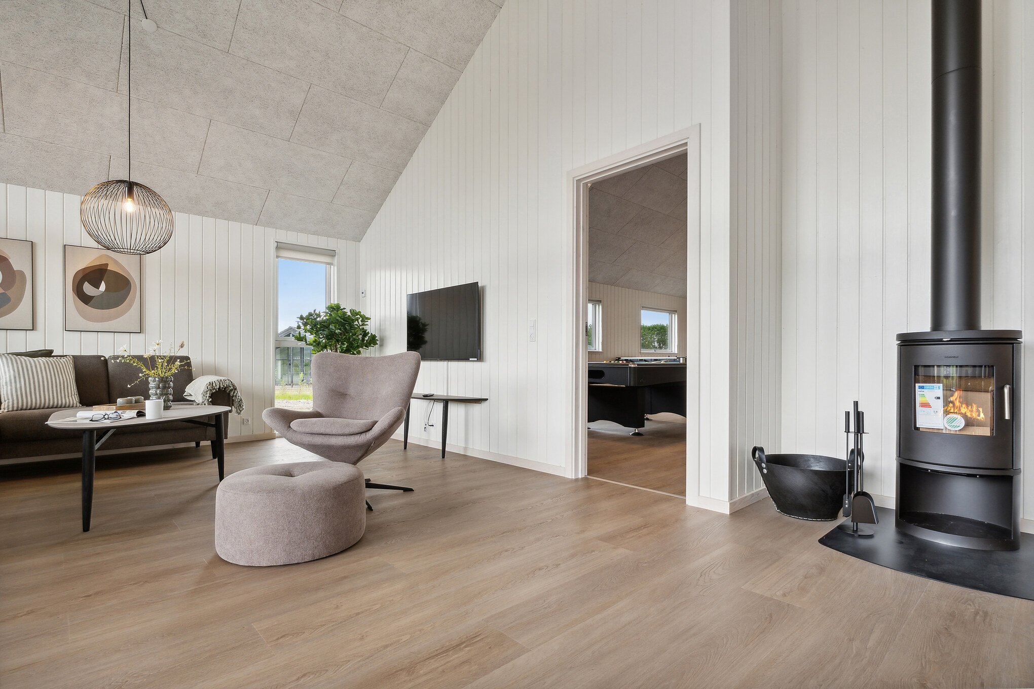 Die Couch im Luxusferienhaus Nr. 696 in Fünen und seine Inseln lädt zu Gesellschaftsspielen oder zu Kinoabenden ein.