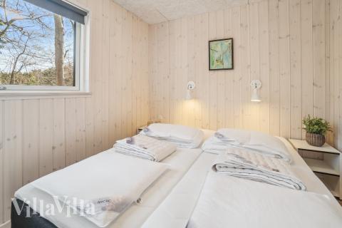 Eines der 7 Schlafzimmer im Luxusferienhaus Nr. 622