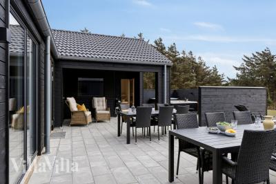 Das Luxusferienhaus Nr. 658 hat eine tolle Terrasse, die mit hochwertigen Gartenmöbeln für 20 Personen ausgestattet ist.