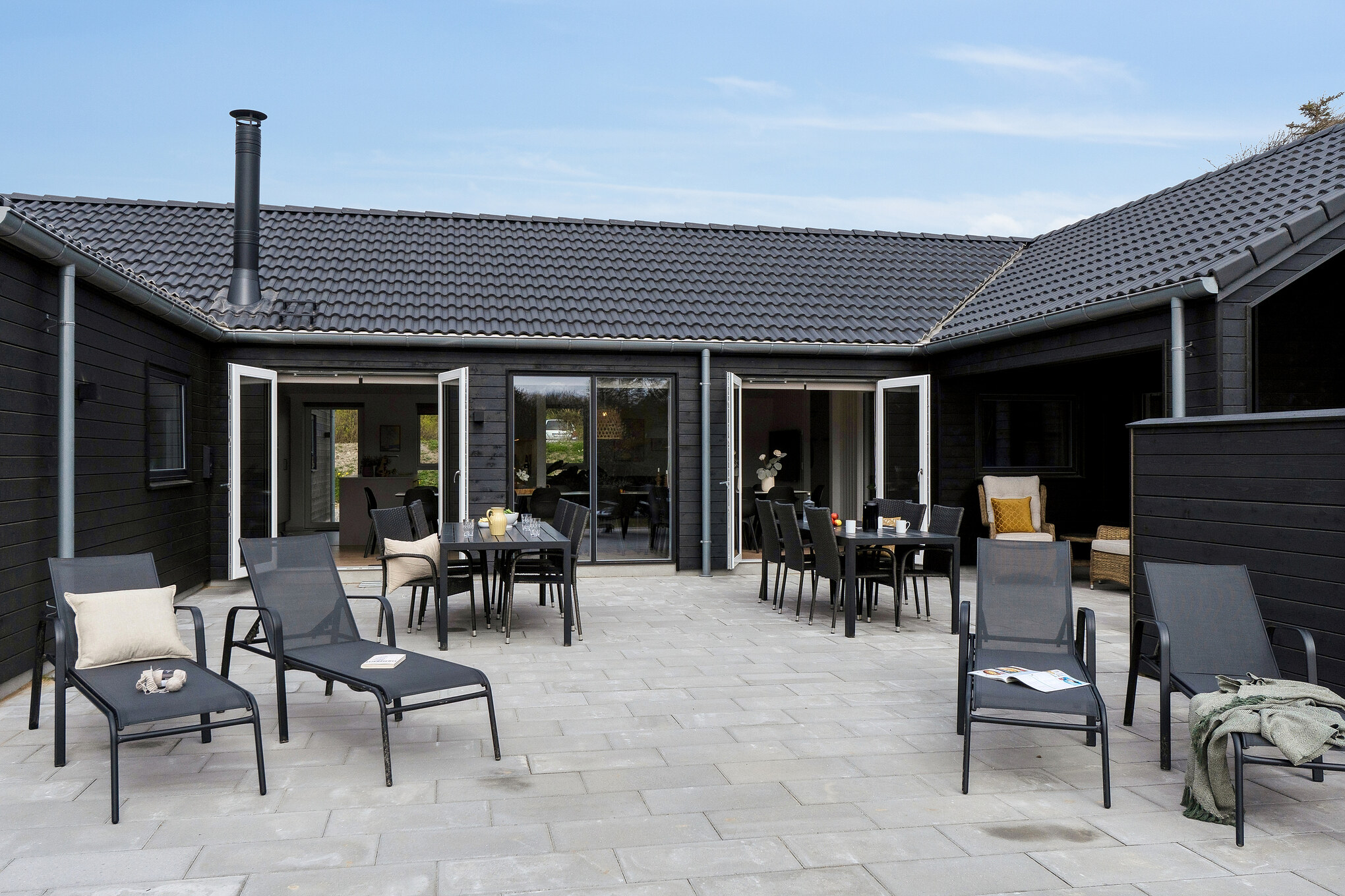 Genießen Sie einen Grillabend auf der Terrasse des Luxusferienhauses Nr. 658 in Nordjütland