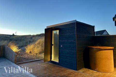 Genießen Sie die heiße Sauna im Luxusferienhaus Nr. 348 für 20 Personen