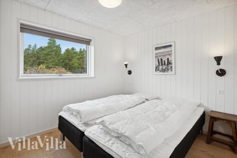 Eines der 12 Schlafzimmer im Luxusferienhaus Nr. 910