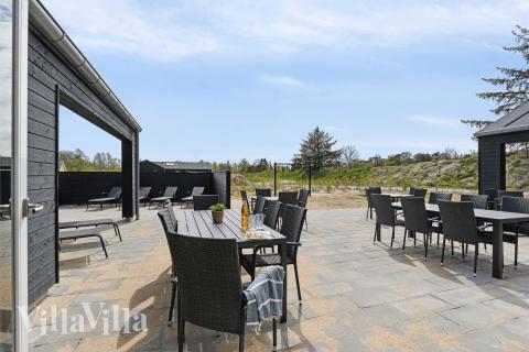 Das Luxusferienhaus Nr. 910 hat eine tolle Terrasse, die mit hochwertigen Gartenmöbeln für 30 Personen ausgestattet ist.