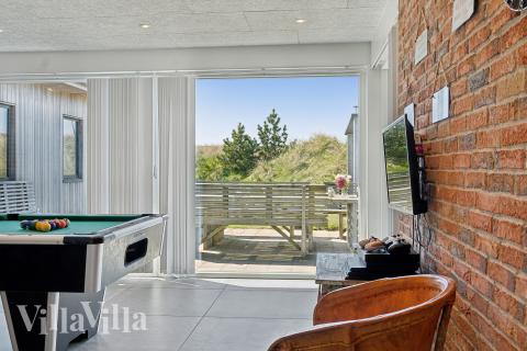 Das Luxusferienhaus 607 für 18 Personen hat einen großen Aktivitätsraum mit u. a. Billard und Darts