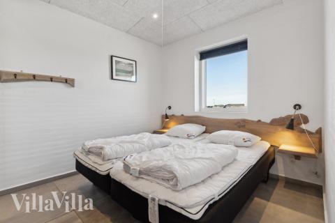 Eines der 8 Schlafzimmer im Luxusferienhaus Nr. 607