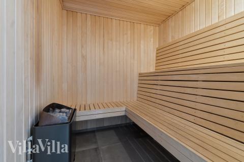 Genießen Sie die heiße Sauna im Luxusferienhaus Nr. 607 für 18 Personen