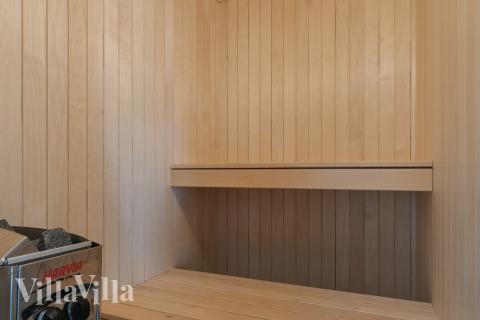 Genießen Sie die heiße Sauna im Luxusferienhaus Nr. 803 für 16 Personen