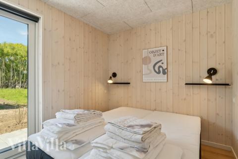 Eines der 6 Schlafzimmer im Luxusferienhaus Nr. 803