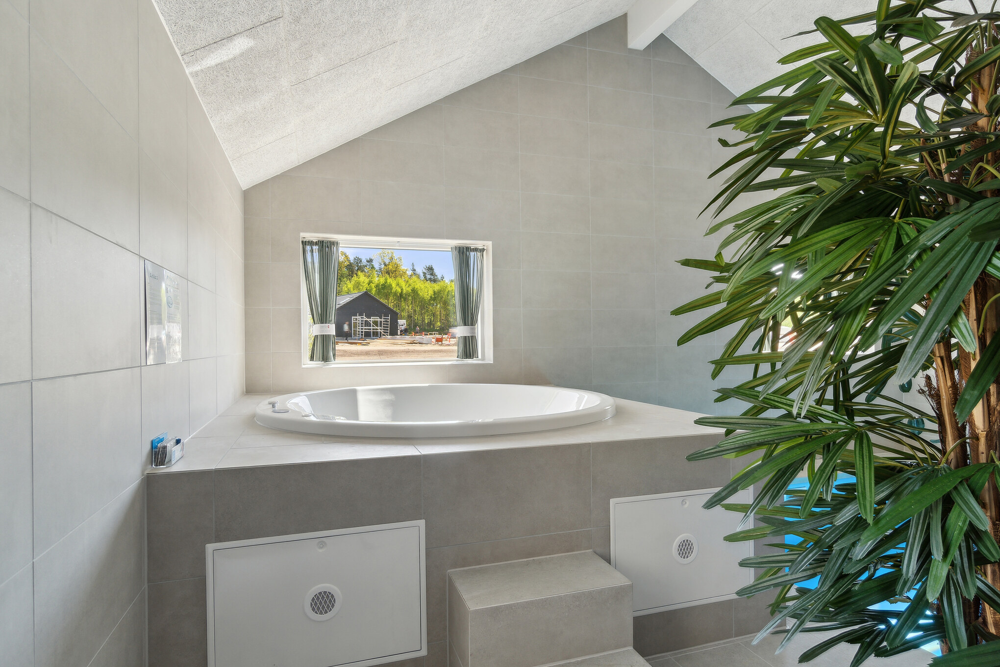 Genießen Sie den warmen Whirlpool im Luxusferienhaus Nr. 809 in Ostjütland