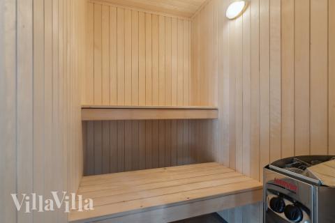 Genießen Sie die heiße Sauna im Luxusferienhaus Nr. 809 für 24 Personen