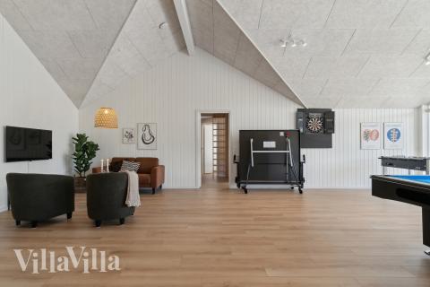Das Luxusferienhaus 809 für 24 Personen hat einen großen Aktivitätsraum mit u. a. Billard und Darts