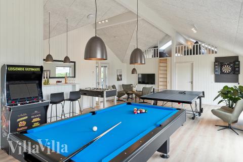 Neben den vielen schönen Stunden, die man im Poolbereich des Hauses verbringen kann, bietet das Luxusferienhaus 659 auch Spielevergnügen bei Billard/Tischtennis und Darts