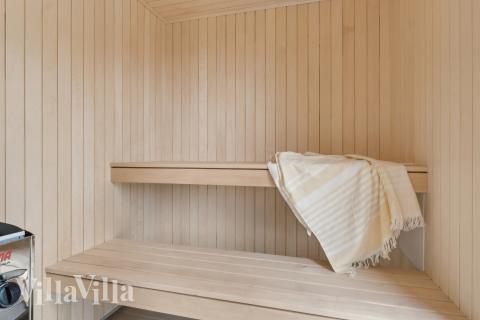 Genießen Sie die heiße Sauna im Luxusferienhaus Nr. 659 für 20 Personen