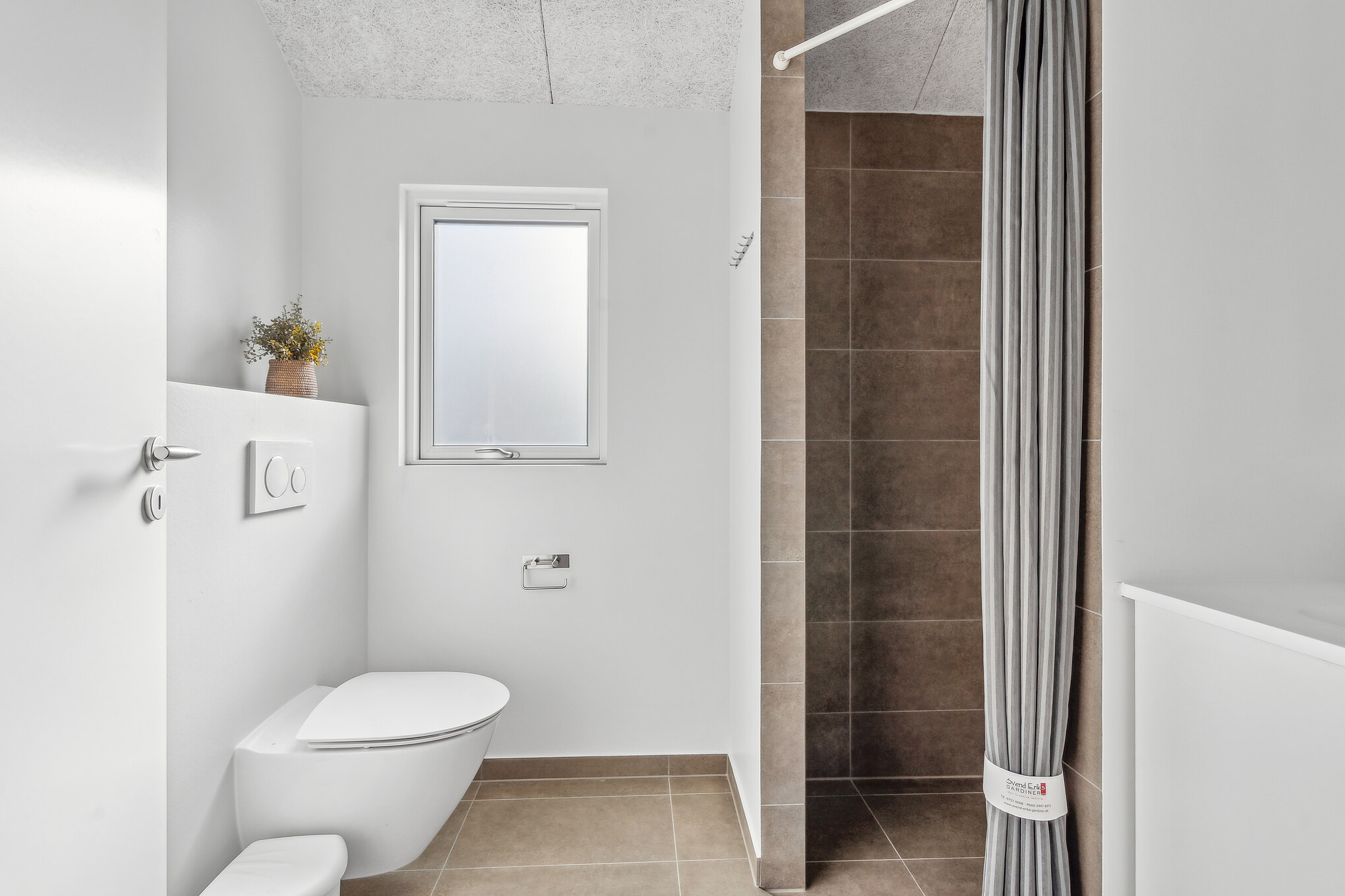 Eines der Badezimmer im Luxusferienhaus Nr. 657