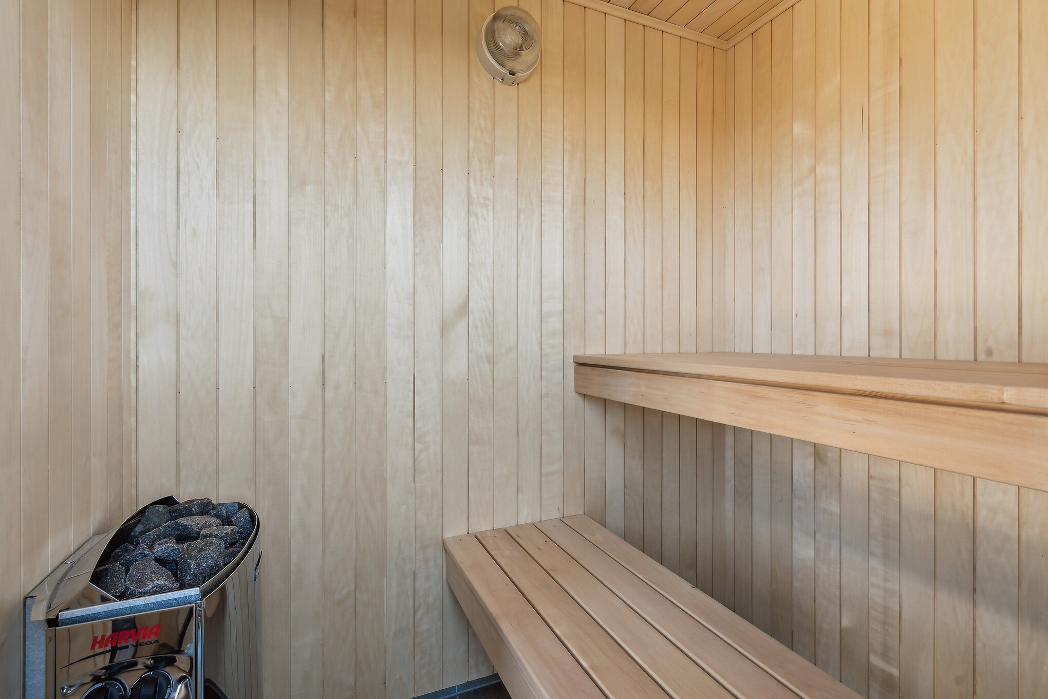 Genießen Sie die heiße Sauna im Luxusferienhaus Nr. 657 für 20 Personen