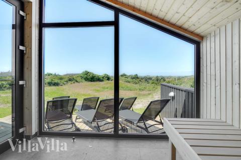 Genießen Sie die heiße Sauna im Luxusferienhaus Nr. 909 für 12 Personen