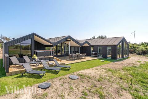 Dieses schöne Poolhaus Nr. 909 mit Platz für 12 Personen liegt in Nordjütland