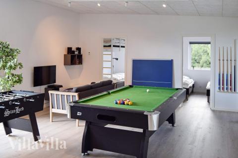 Aktivitätsraum im Luxusferienhaus Nr. 908 mit 6 Schlafzimmern und Platz für 14 Gäste.