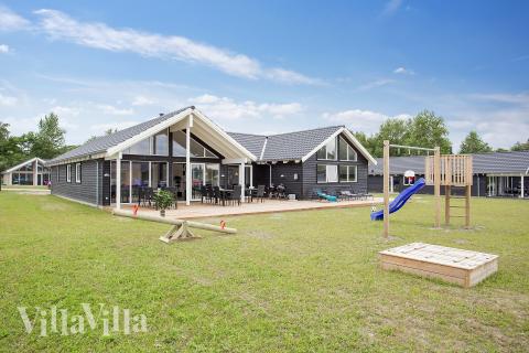 Dieses schöne Poolhaus Nr. 388 mit Platz für 16 Personen liegt in Nordseeland