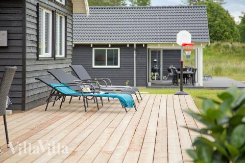 Das Luxusferienhaus Nr. 388 hat eine tolle Terrasse, die mit hochwertigen Gartenmöbeln für 16 Personen ausgestattet ist.
