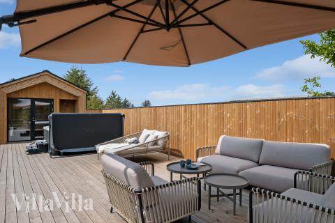 Genießen Sie einen Grillabend auf der Terrasse des Luxusferienhauses Nr. 683 in Nordjütland