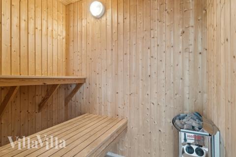 Genießen Sie die heiße Sauna im Luxusferienhaus Nr. 320 für 18 Personen