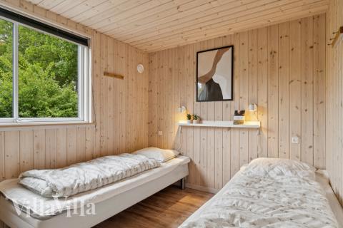Eines der 7 Schlafzimmer im Luxusferienhaus Nr. 320