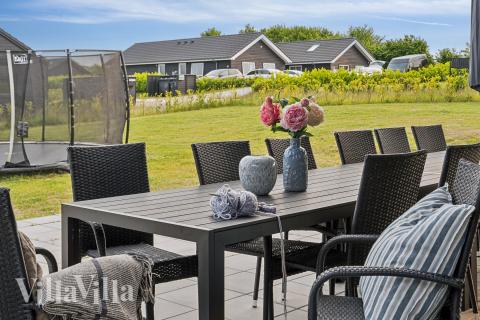 Das Luxusferienhaus Nr. 632 hat eine tolle Terrasse, die mit hochwertigen Gartenmöbeln für 18 Personen ausgestattet ist.