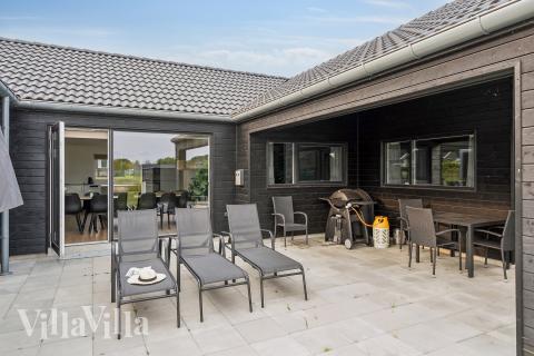 Genießen Sie einen Grillabend auf der Terrasse des Luxusferienhauses Nr. 632 in Südjütland