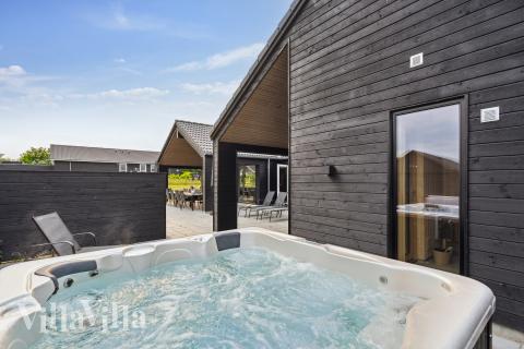 Das Luxusferienhaus Nr. 632 bietet u. a. einen tollen Whirlpool