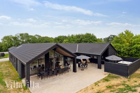 Dieses schöne Poolhaus Nr. 662 mit Platz für 18 Personen liegt in Südjütland