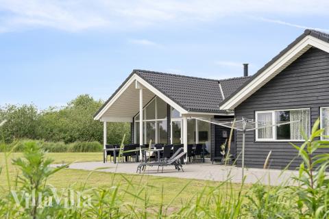 Dieses schöne Poolhaus Nr. 459 mit Platz für 16 Personen liegt in Lolland/Falster/Mön
