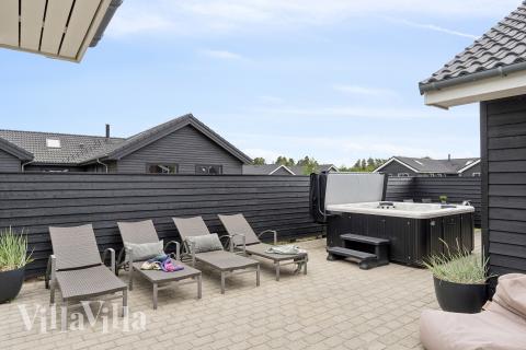 Das Luxusferienhaus Nr. 458 hat eine tolle Terrasse, die mit hochwertigen Gartenmöbeln für 18 Personen ausgestattet ist.