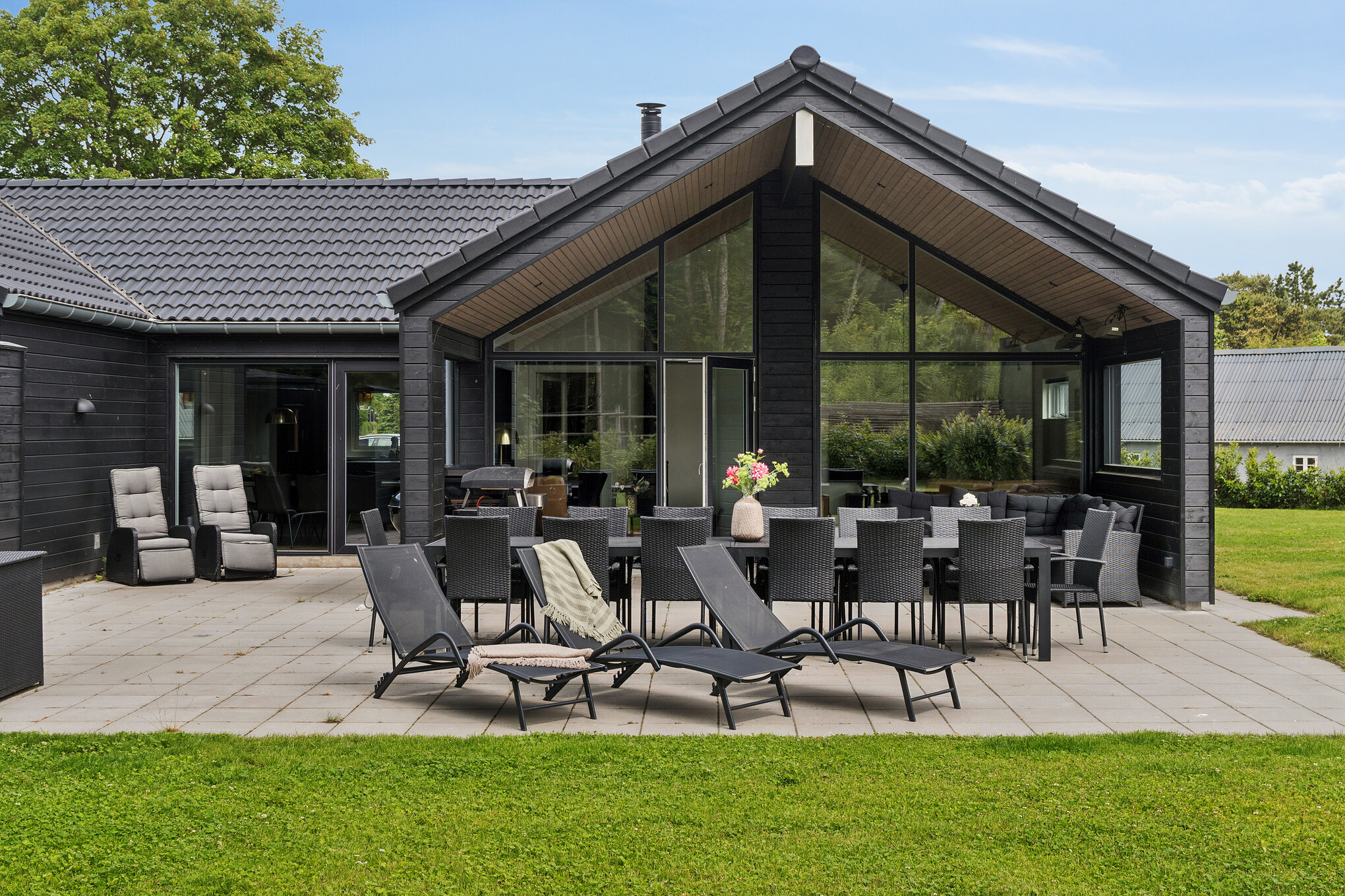 Das Luxusferienhaus Nr. 584 hat eine tolle Terrasse, die mit hochwertigen Gartenmöbeln für 14 Personen ausgestattet ist.
