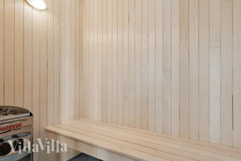 Genießen Sie die heiße Sauna im Luxusferienhaus Nr. 807 für 26 Personen