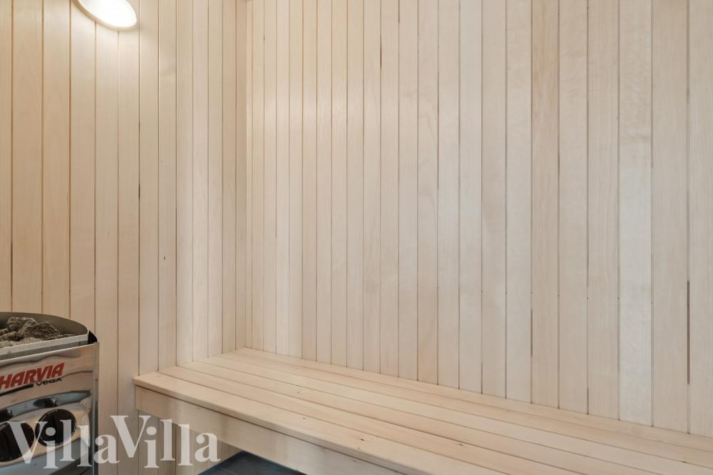 Genießen Sie die heiße Sauna im Luxusferienhaus Nr. 807 für 26 Personen