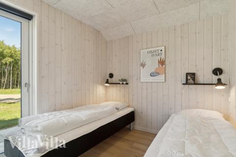 Eines der 10 Schlafzimmer im Luxusferienhaus Nr. 807