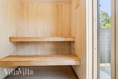 Genießen Sie die heiße Sauna im Luxusferienhaus Nr. 685 für 14 Personen